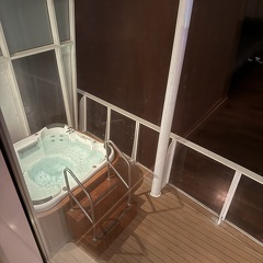 View of balcony hot tub from upstairs landing